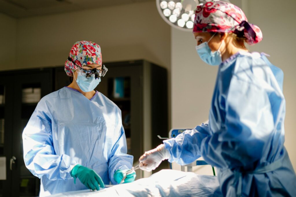 Tummy Tuck Surgeons Performing Procedure
