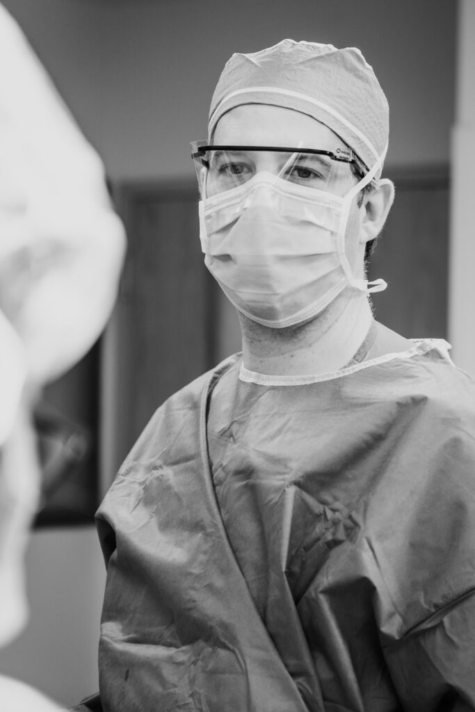 Gynecomastia surgeon in the operating room