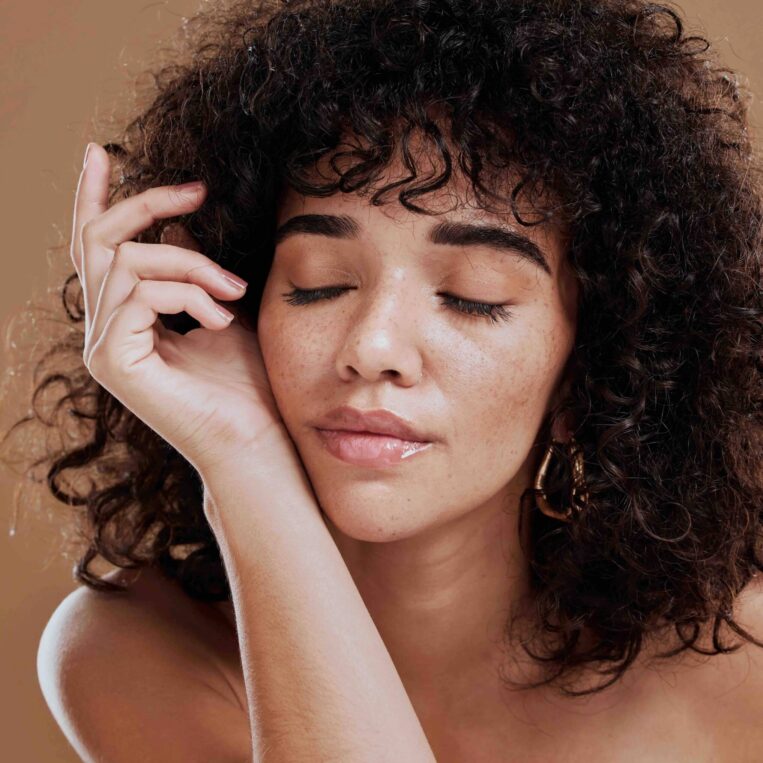 Beautiful patient with hand in hair