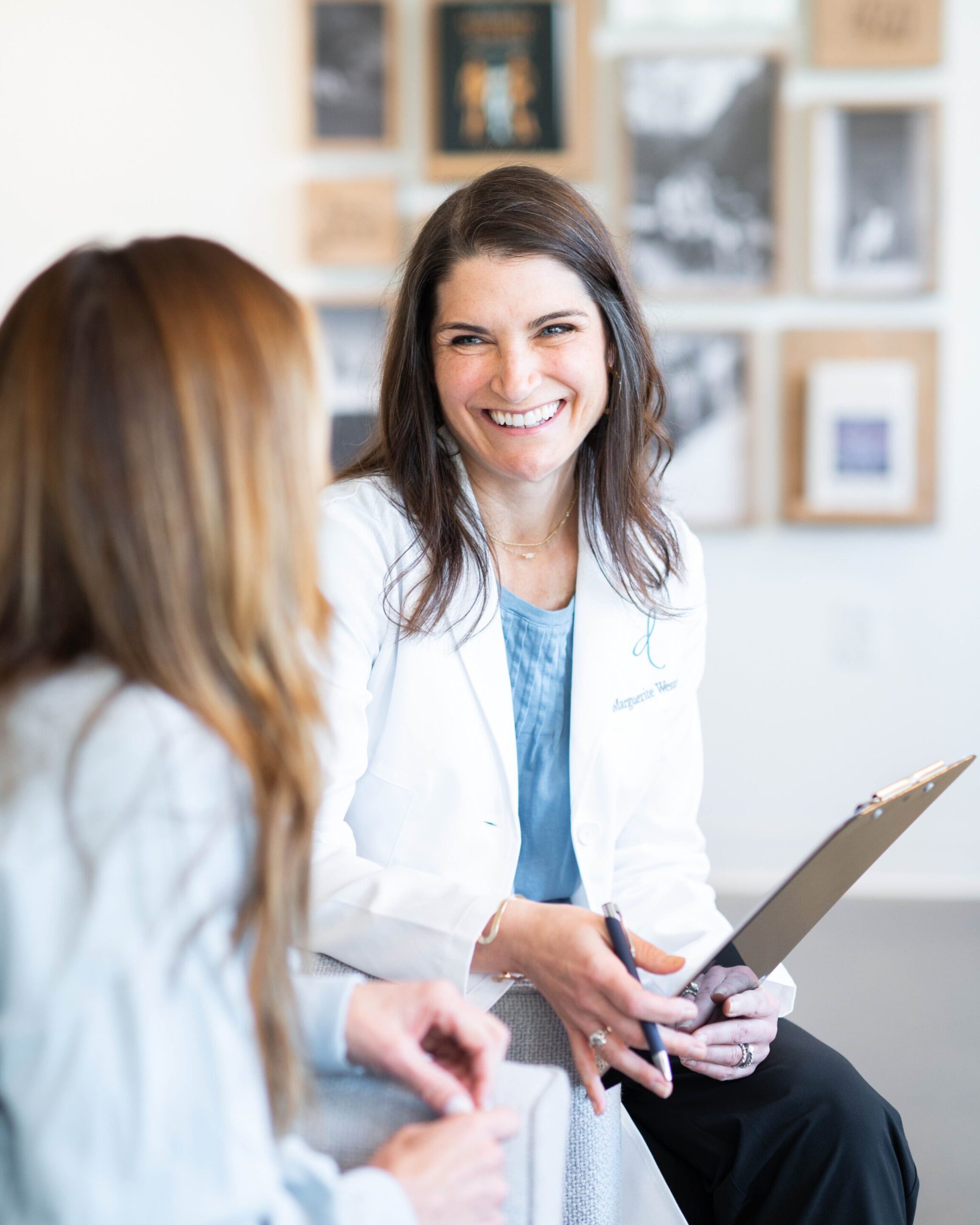 Dr. Marguerite Weston with a functional medicine patient