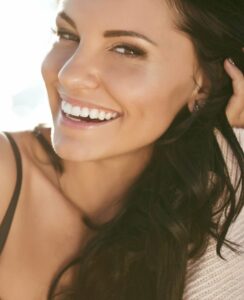Smiling woman with brown hair