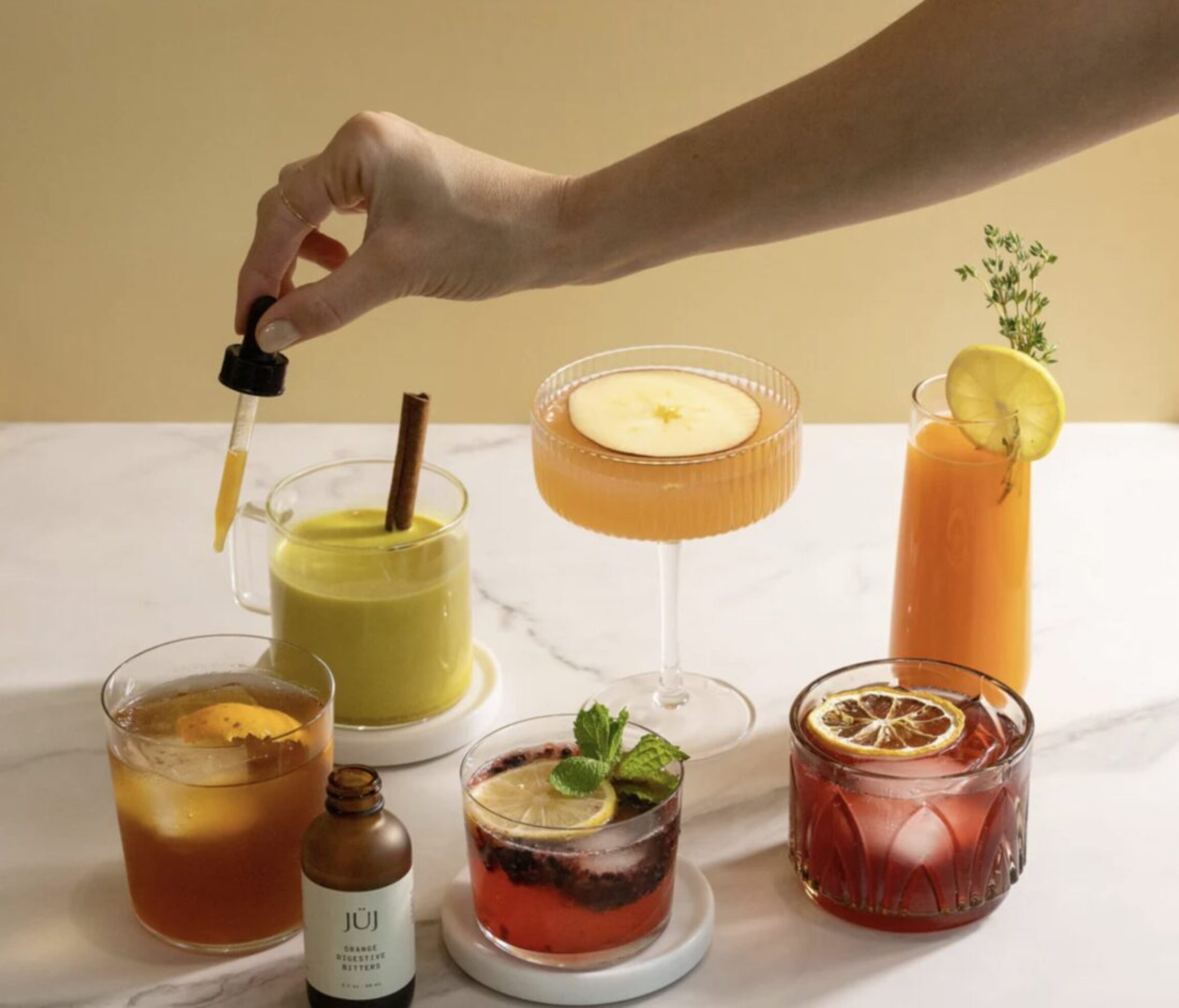 Adding JUJ Bitters to various beverages