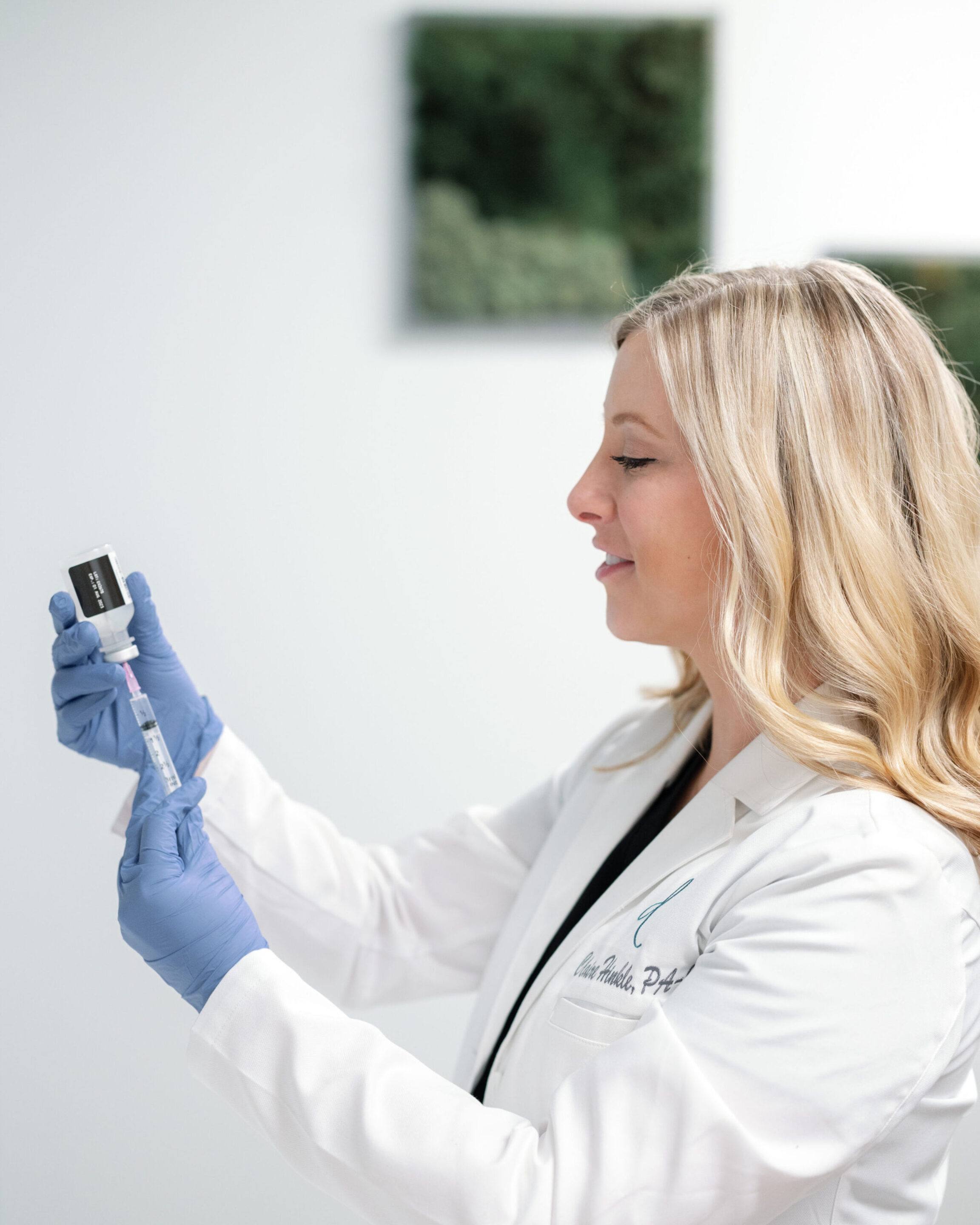 Claire preparing Botox injections to enhance eyes