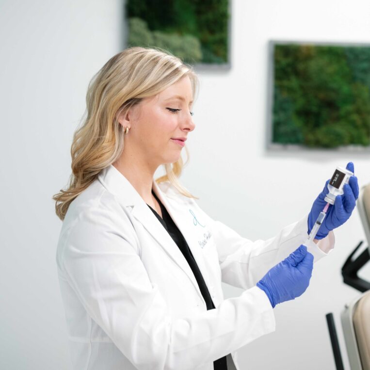 Claire preparing to use filler injections to help tighten skin