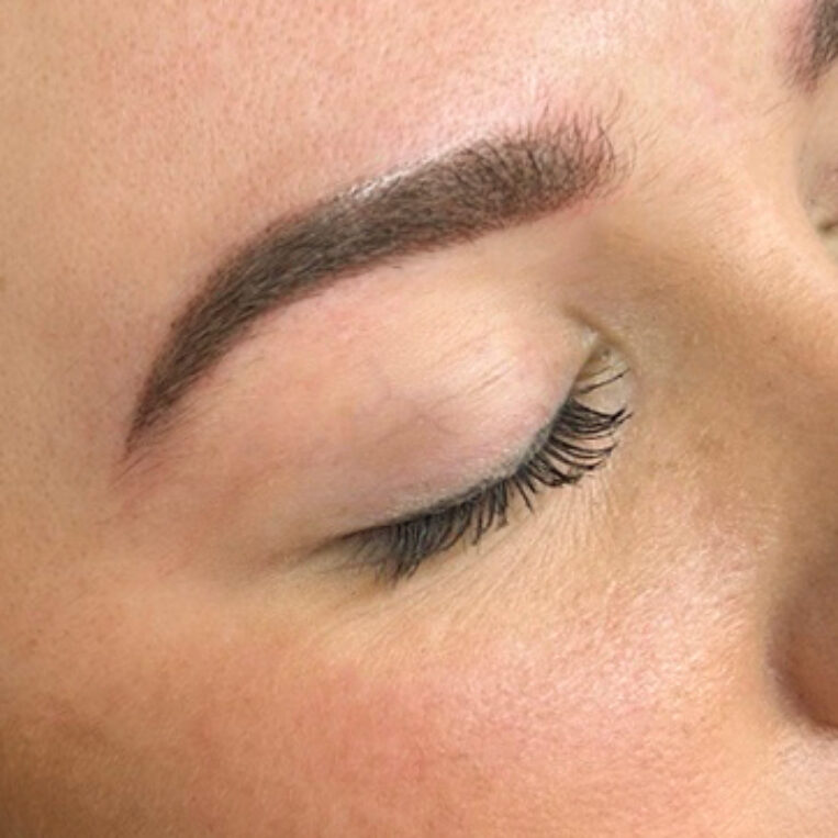 Up close photo of powder brows right after treatment