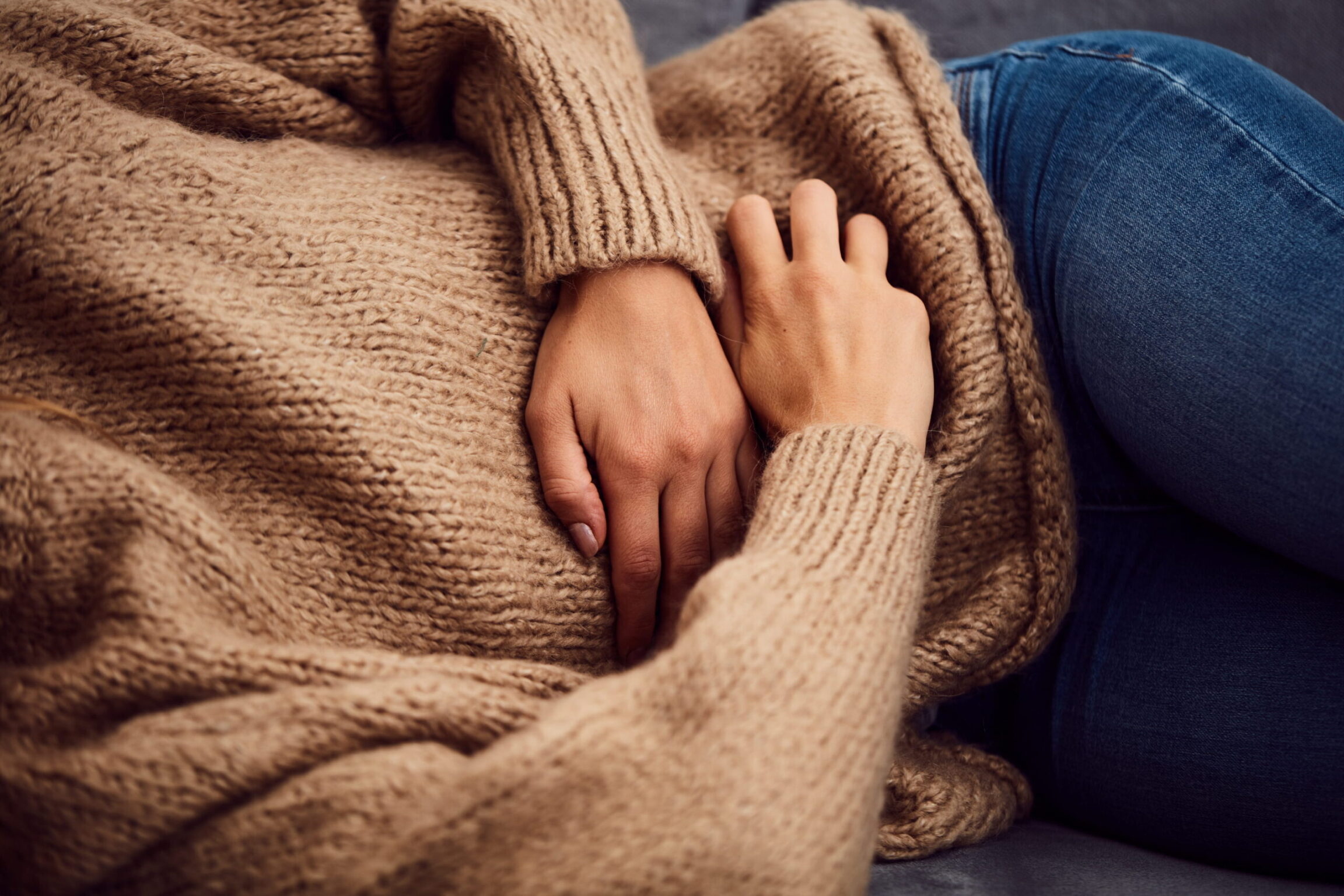 Person struggling with GI issues