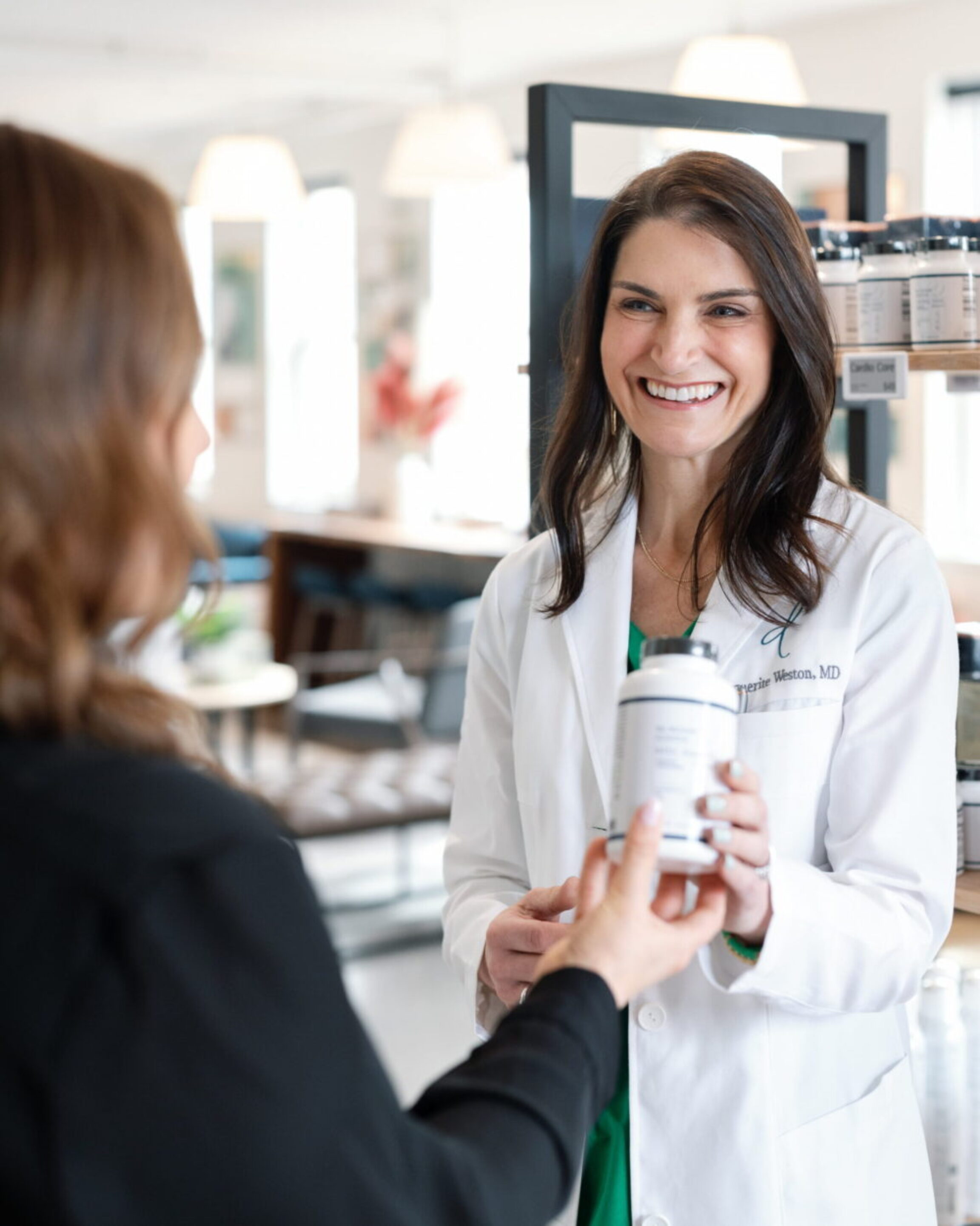 Dr. Weston explaining supplements to a menopause patient in Columbus Ohio
