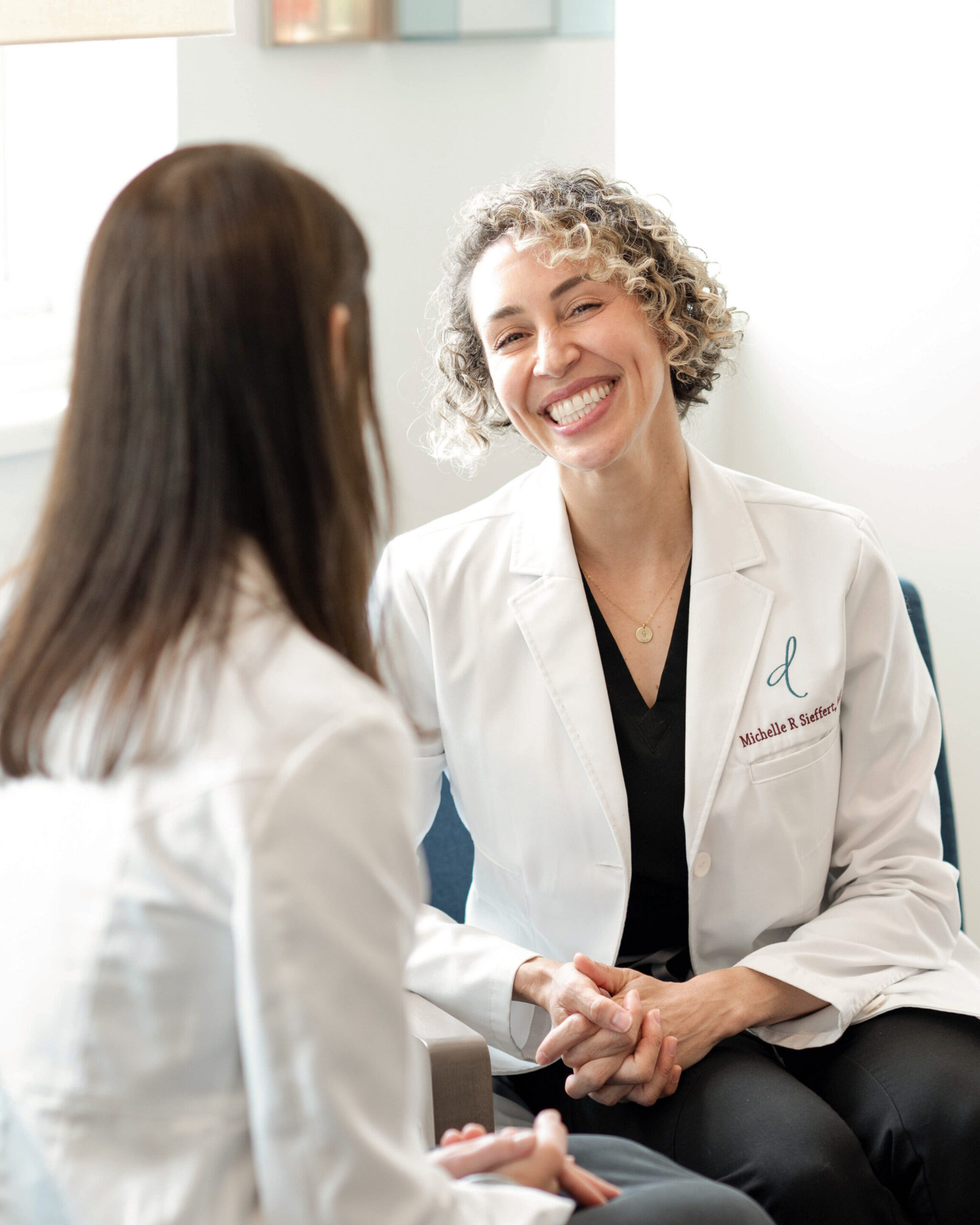 Dr. Sieffert discussing breast implant removal surgery in the Dublin Ohio office