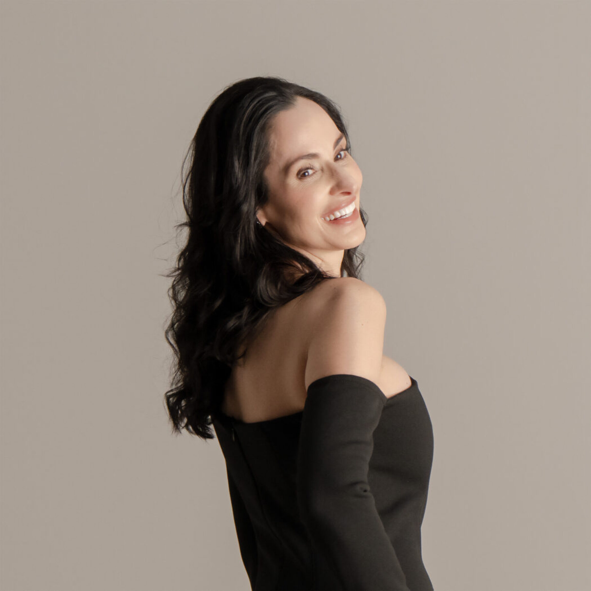 Donaldson plastic surgery patient posing in muted lighting