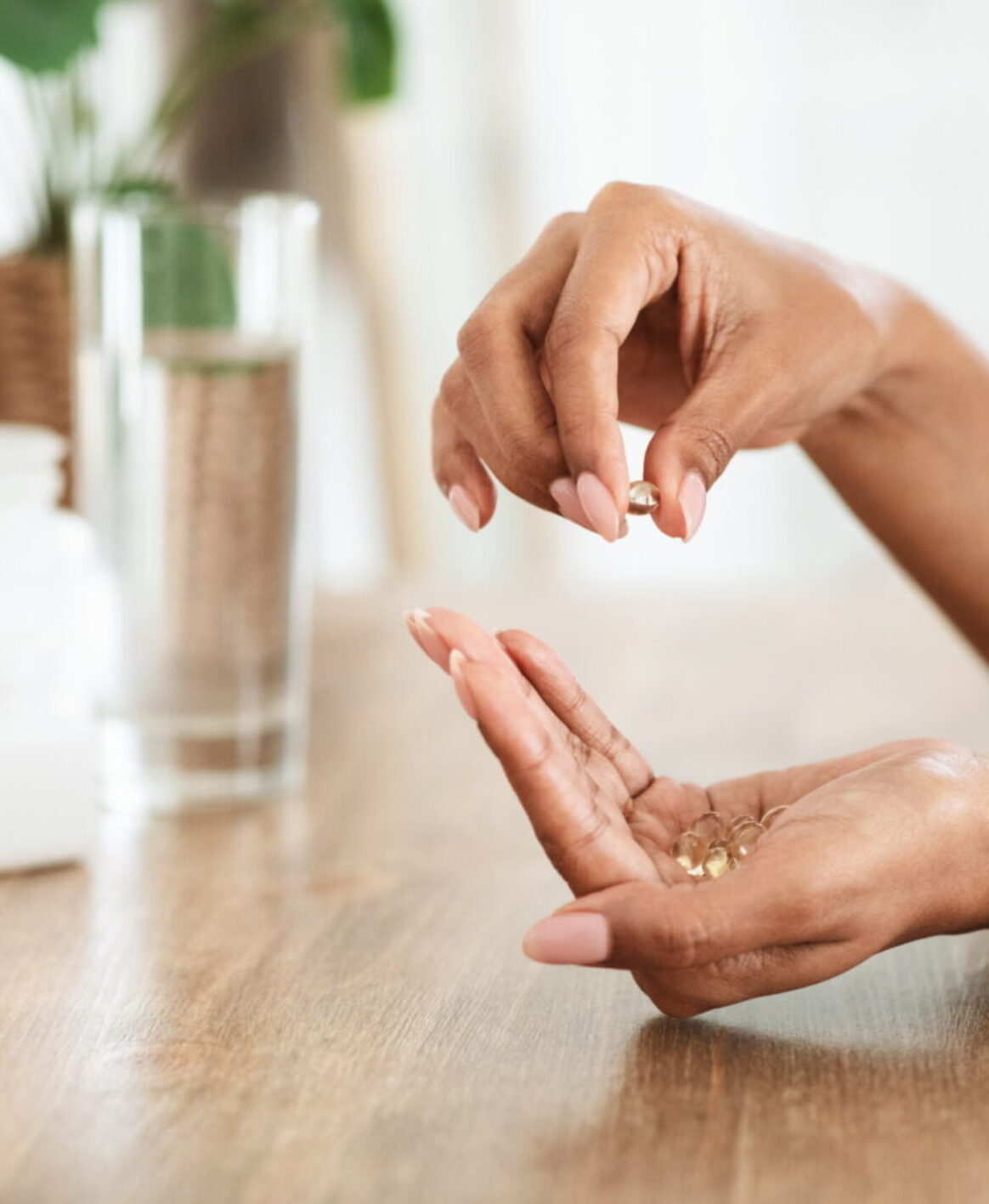 A patient preparing to take their morning supplements