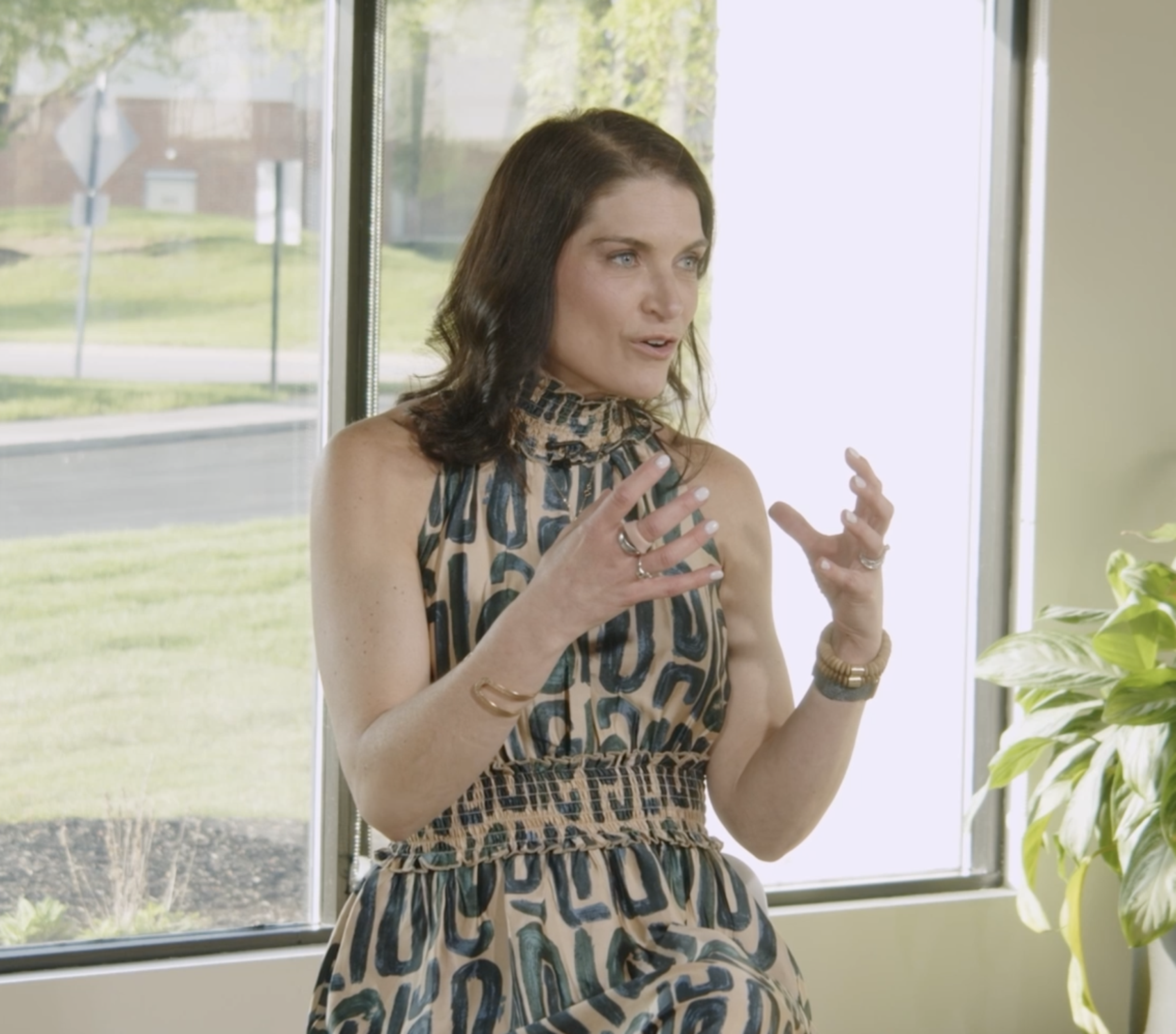 Dr. Marguerite Weston explaining how hormones change at certain ages during a live taping of the Asking For A Friend podcast