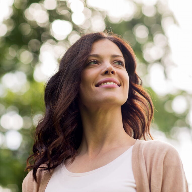 A woman walking outside to get natural vitamin D