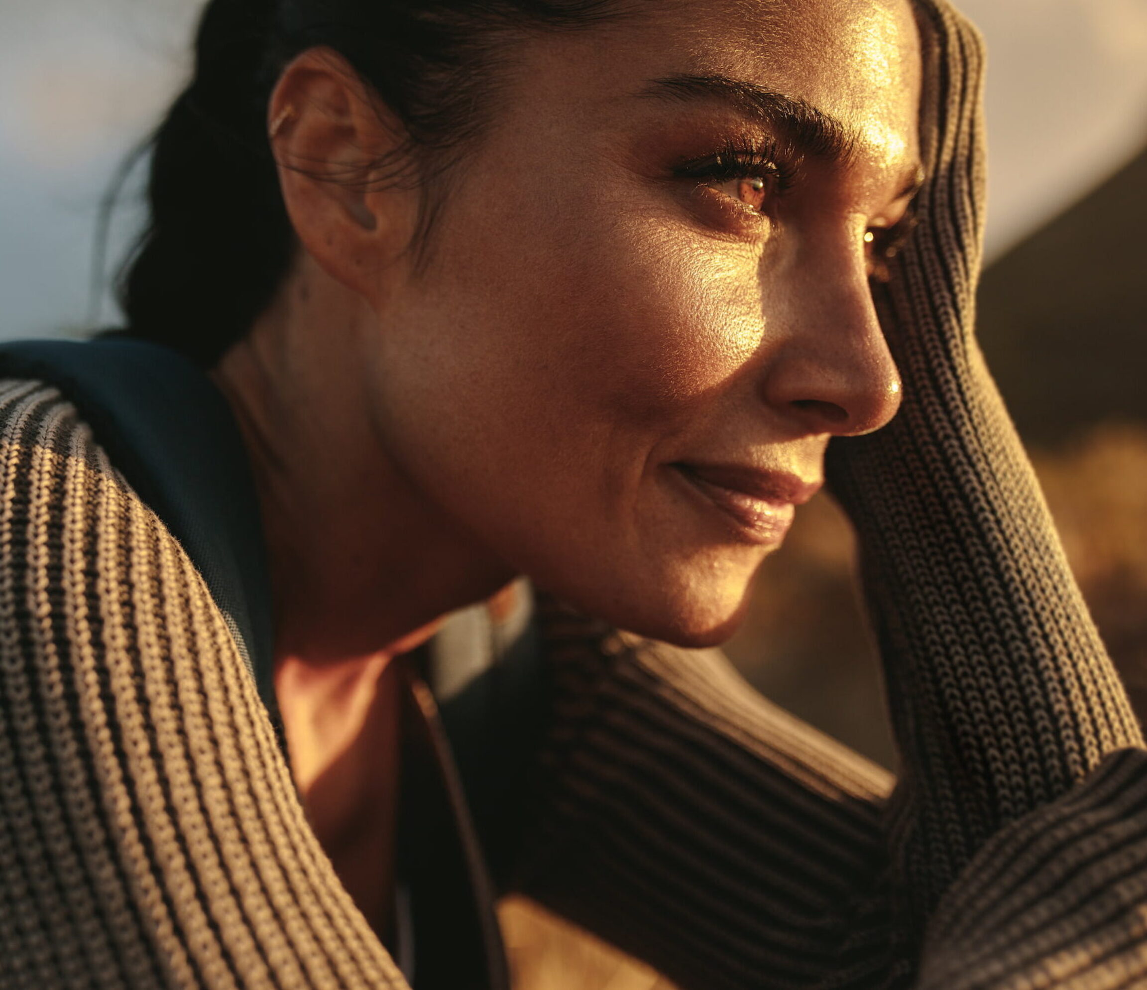 A patient looking out at the horizon as she thinks about her post-surgery life