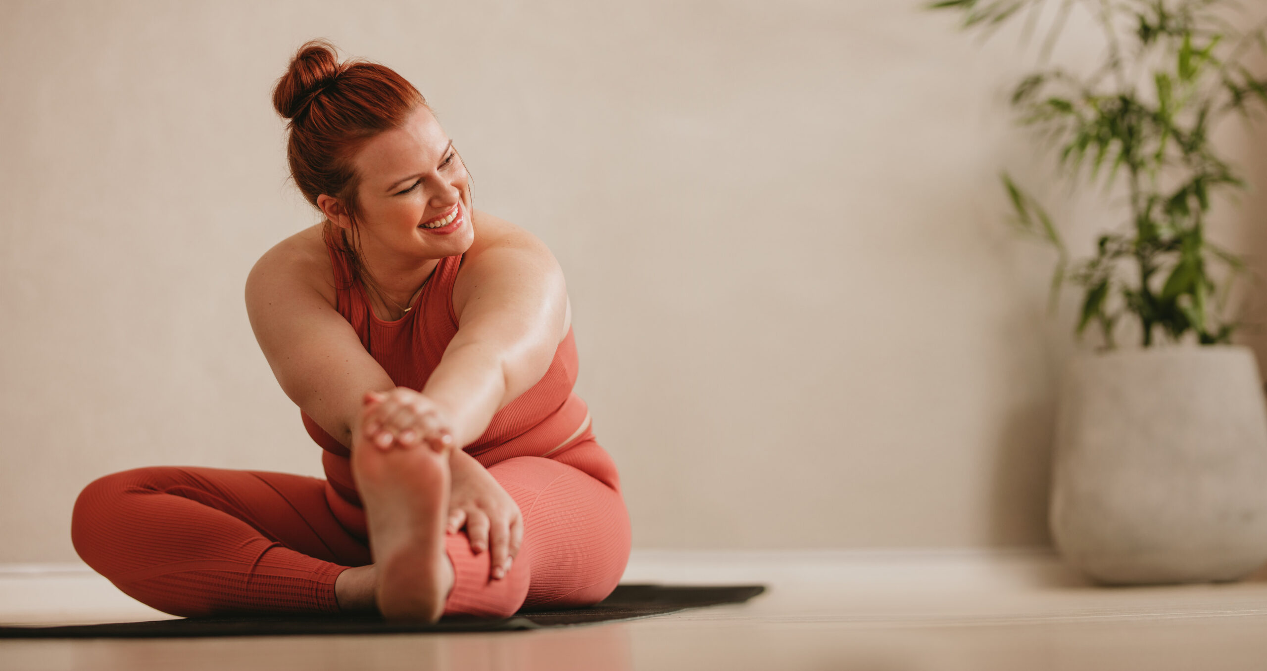 A patient participating in a group yoga class