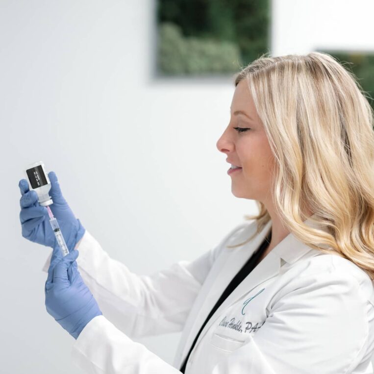 Claire Hinkle, PA-C, preparing a syringe for a hyperhidrosis treatment