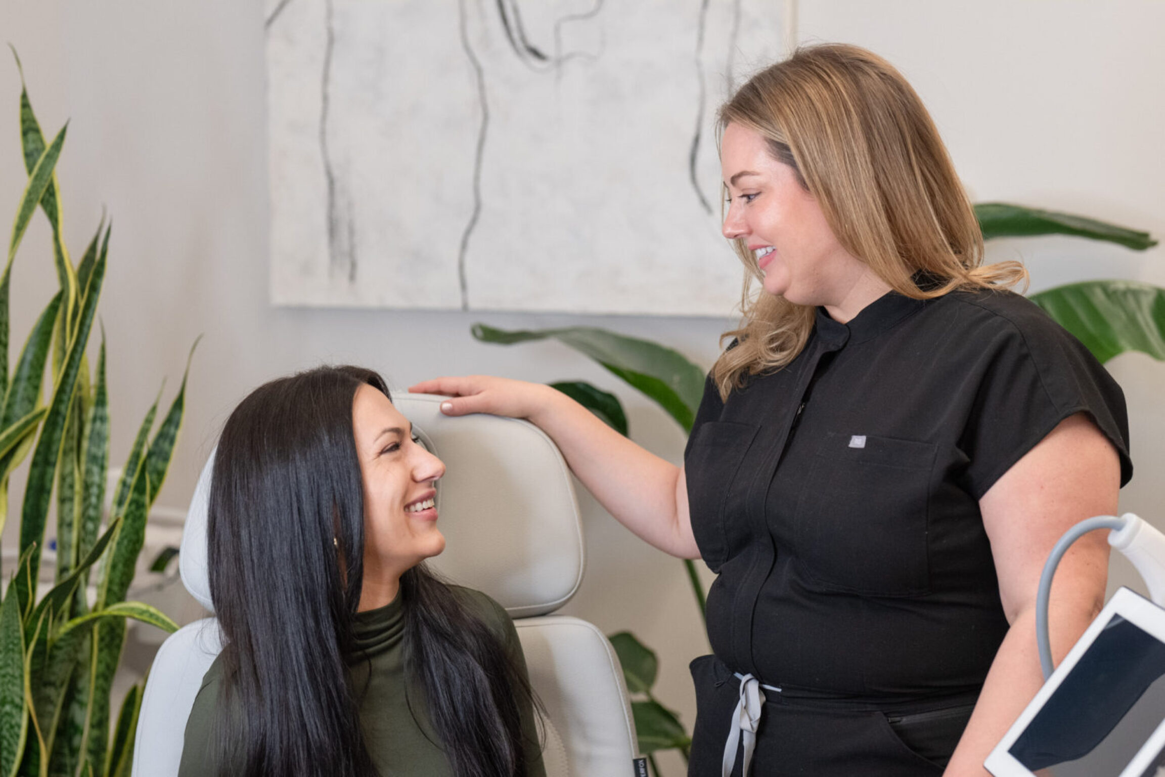 Provider Paige working with a comfortable patient in our private medical office space
