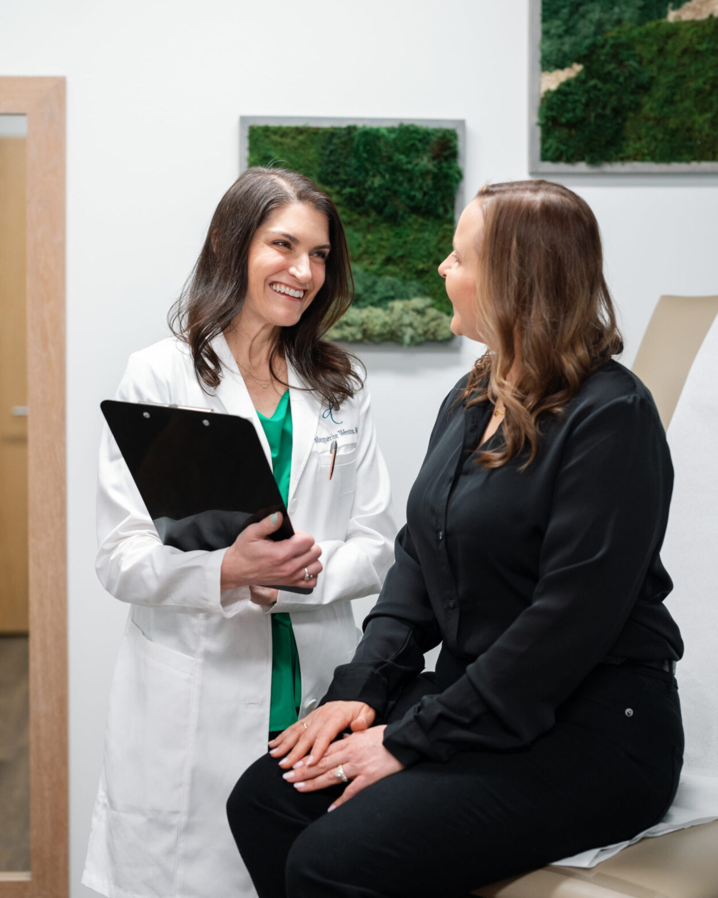 Dr. Weston discussing 3x4 Genetic Testing results with a patient in the Dublin, Ohio office