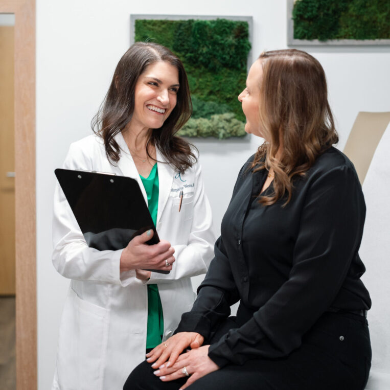 Dr. Weston discussing 3x4 Genetic Testing results with a patient in the Dublin, Ohio office