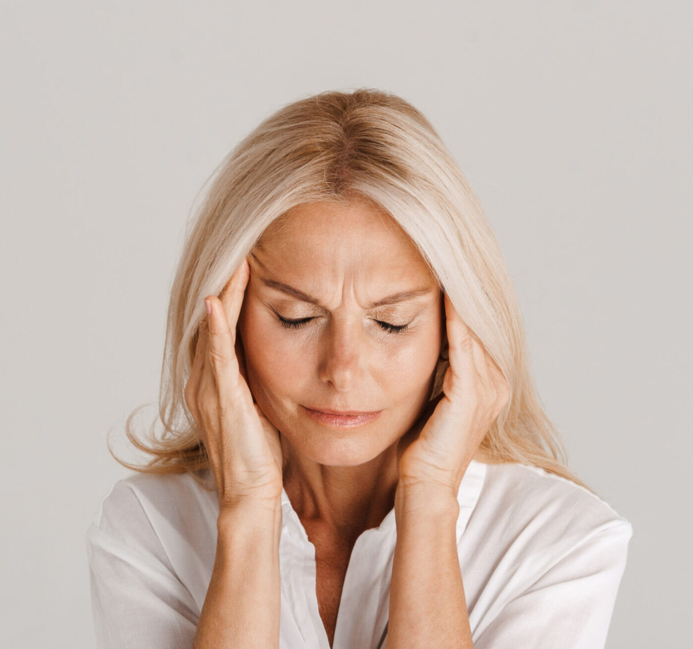 A functional medicine patient who looks stressed from work